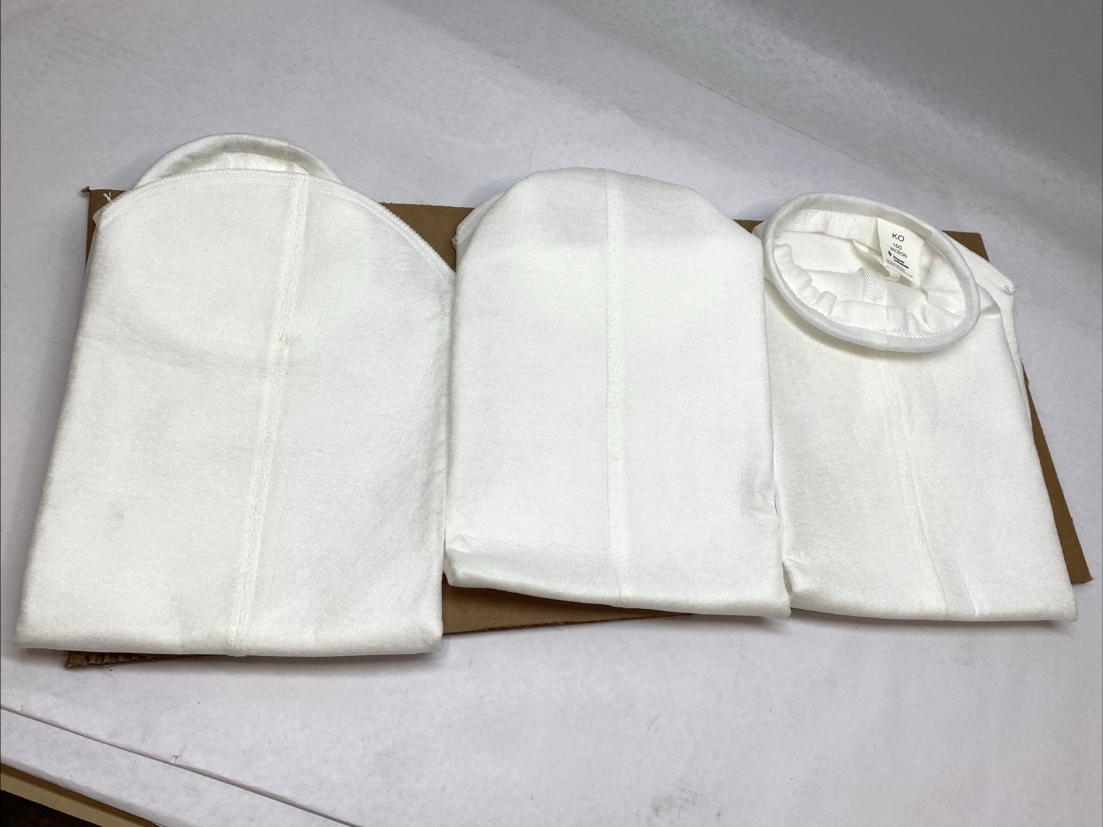 KO100K2S | Pentair 100 Micron Size 2 Polypropylene Felt Bag Filter 7" LOT OF 10 - New - Maverick Industrial Sales