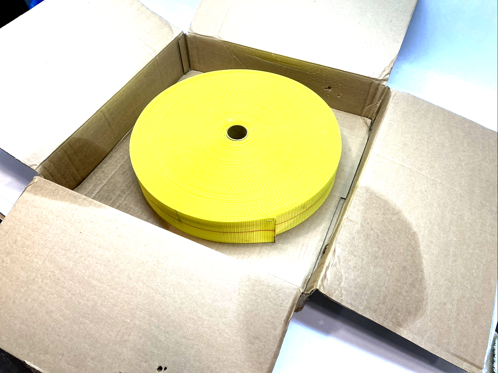 PE03300PY | Bulk-Strap 3"x300' Polyester Webbing Yellow 4,900 lb WLL - New – Open box - Maverick Industrial Sales