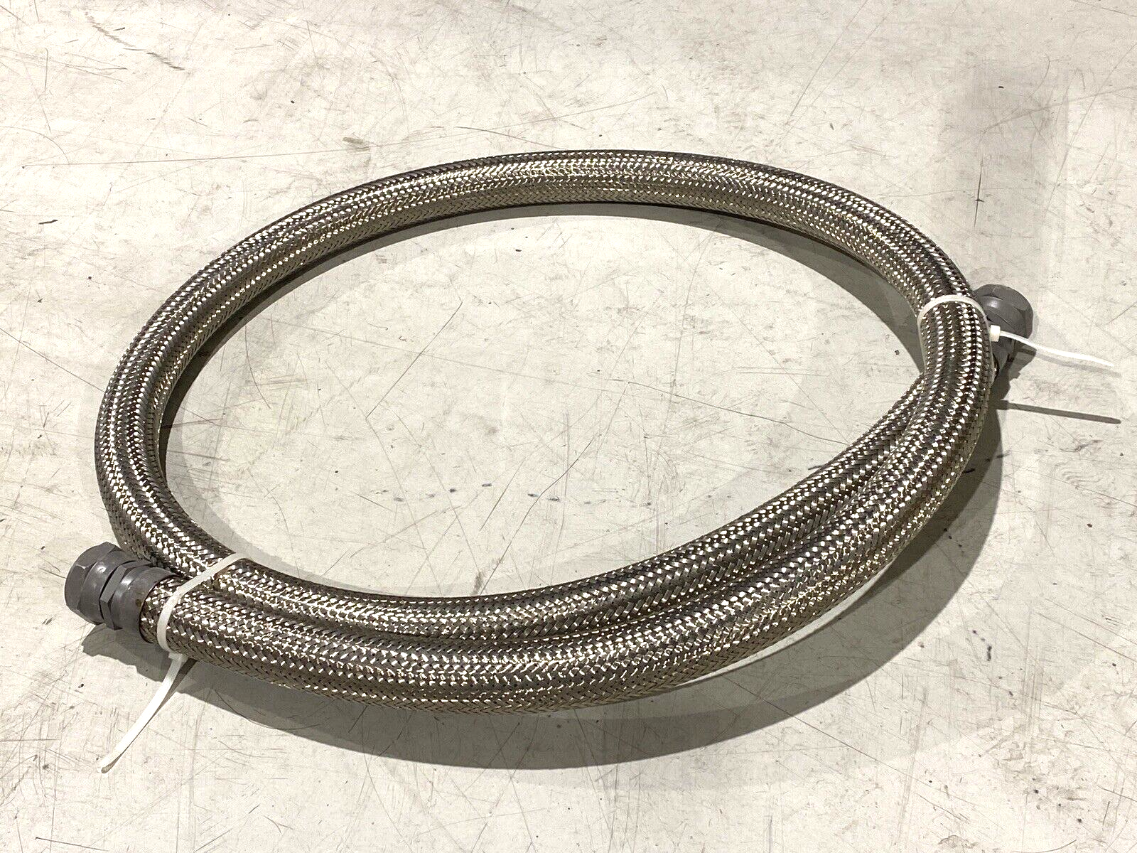 Braided Flexible Hose 2" Wide 10ft Length 1-3/4" NPT Female Connectors - Maverick Industrial Sales