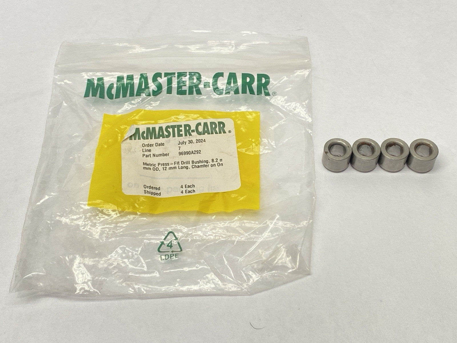 96990A292 Drill Bushing 8.2mm ID 15mm OD 12mm Long Chamfer On One End LOT OF 4 - Maverick Industrial Sales