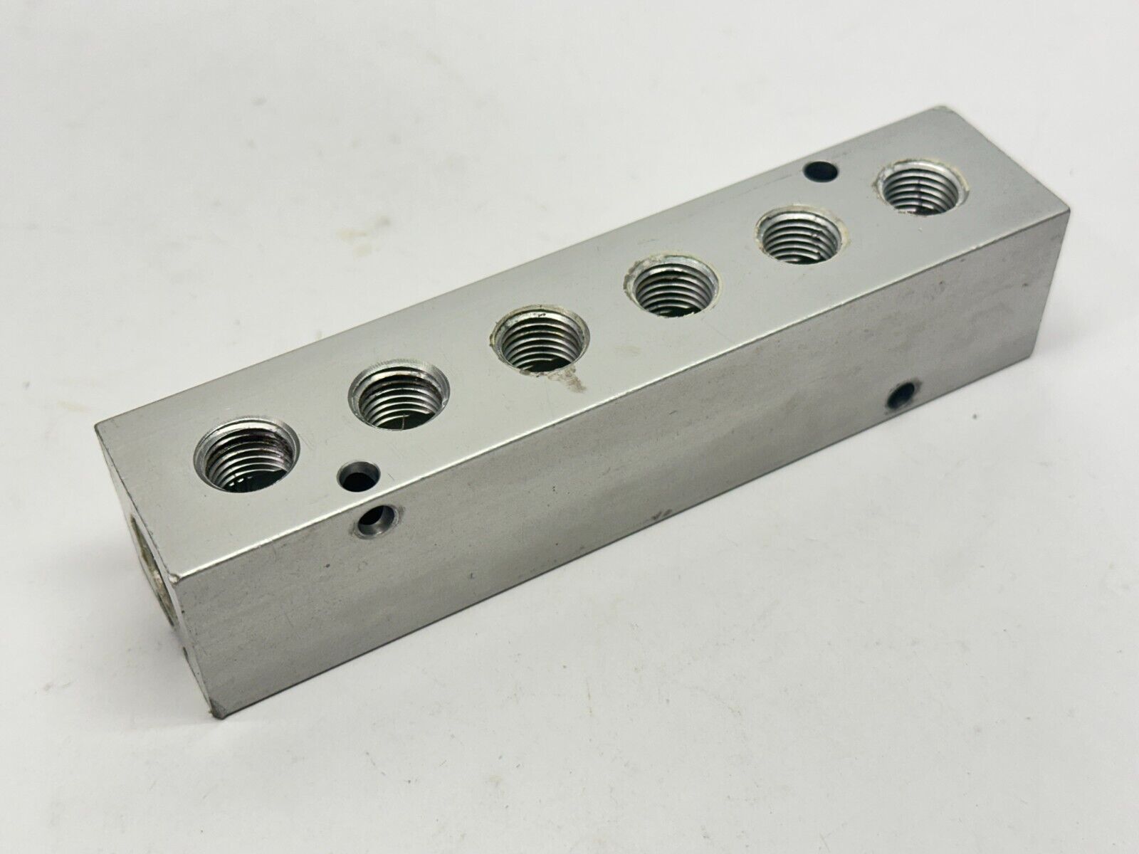 15028-6 | Clippard 6 Station Manifold w/ Mounting Strip - Used - Maverick Industrial Sales