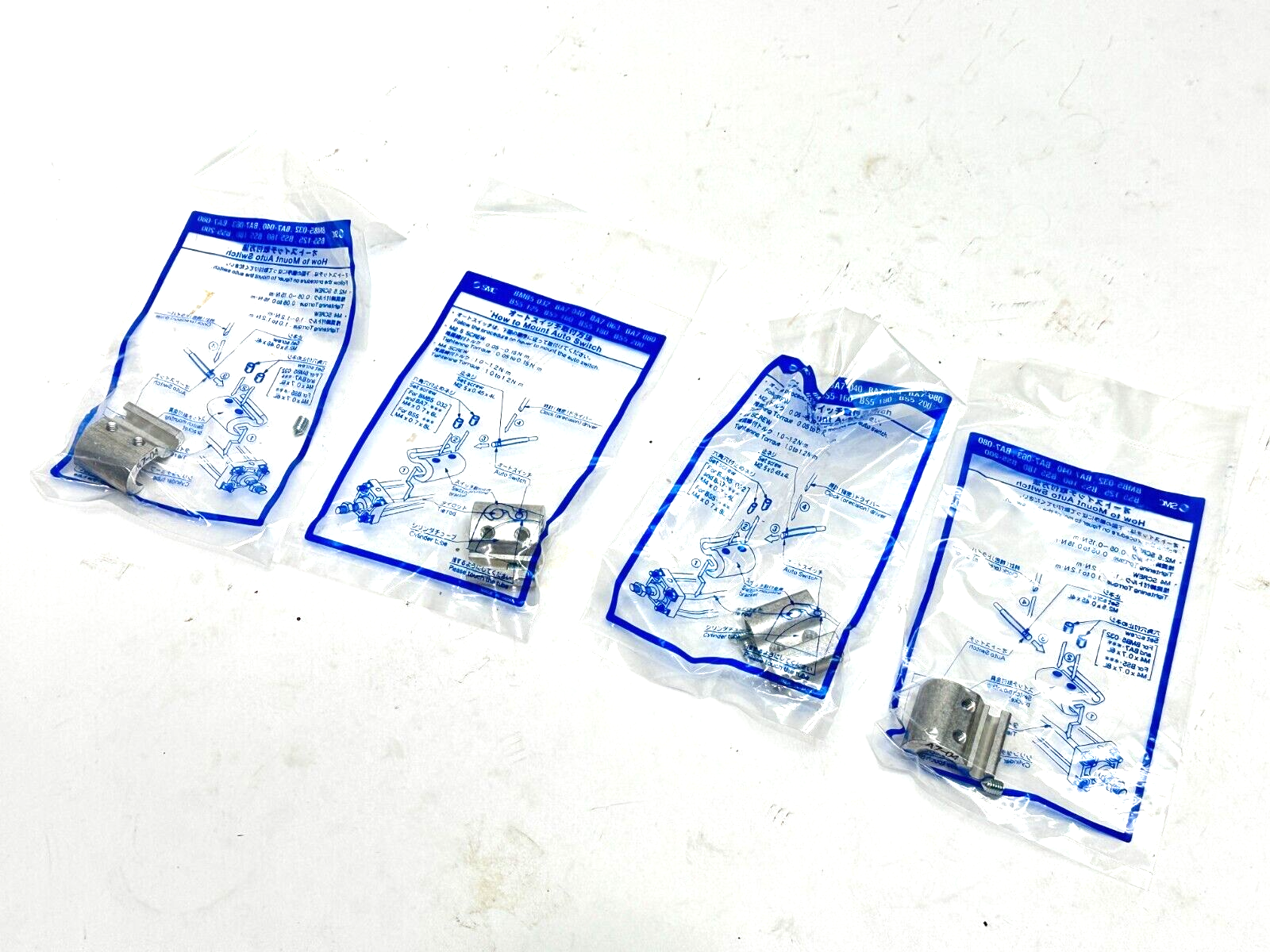 SMC BA7-040 Auto Switch Mounting Bracket LOT OF 4 - New - Maverick Industrial Sales