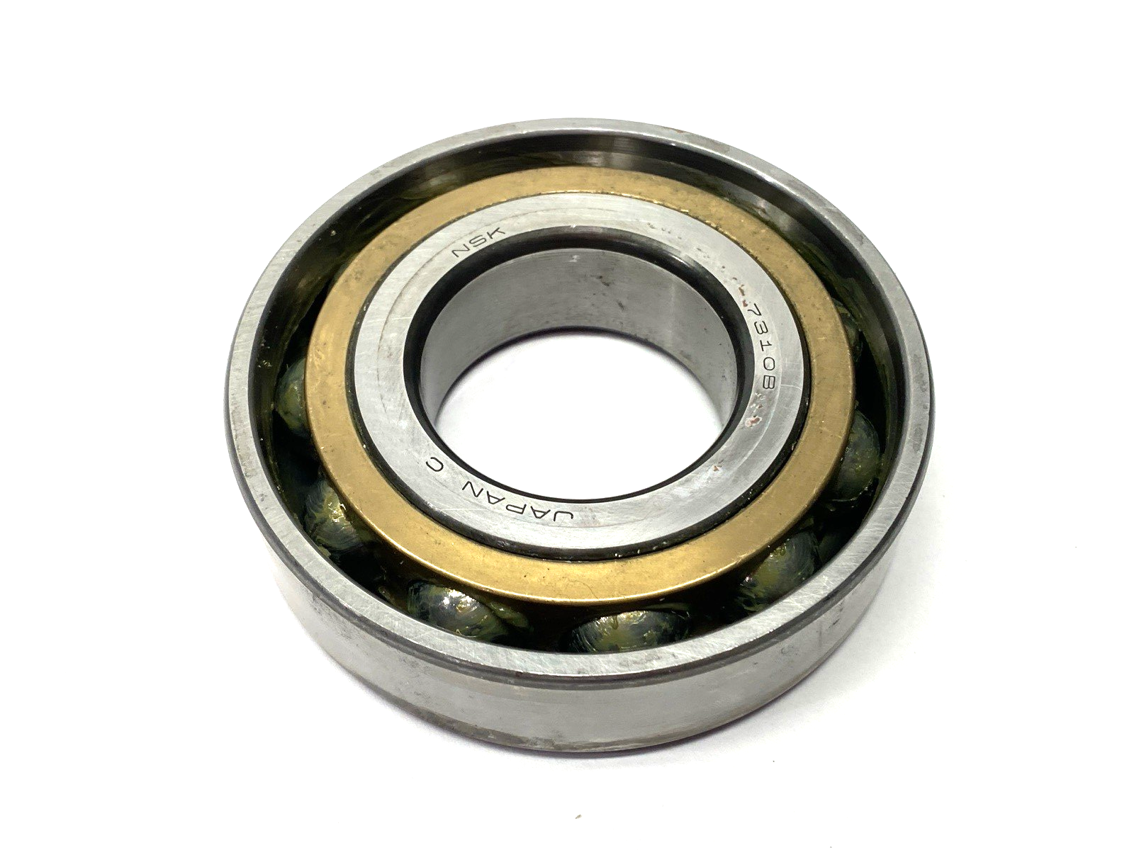 NSK 7310B Angular Contact Ball Bearing 50mm Bore 110mm O.D. 27mm Width - Maverick Industrial Sales
