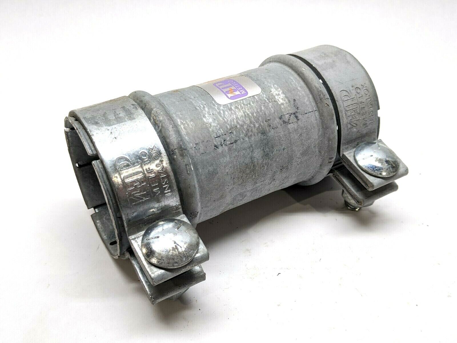 2.50 x 6 | HP Metflow 2-1/2"x6" Instalok Vacuum Coupling Galvanized 2.50" - Used - Maverick Industrial Sales