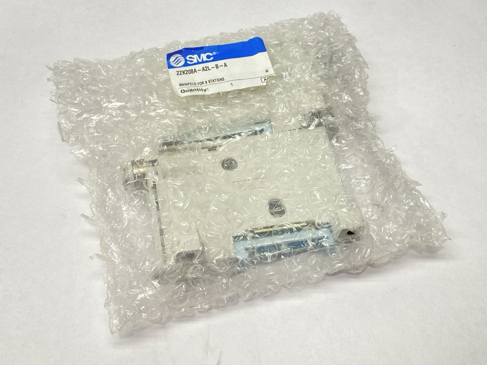 ZZK208A-A2L-B-A | SMC Manifold Side Blocks For 8 Stations - New - Maverick Industrial Sales