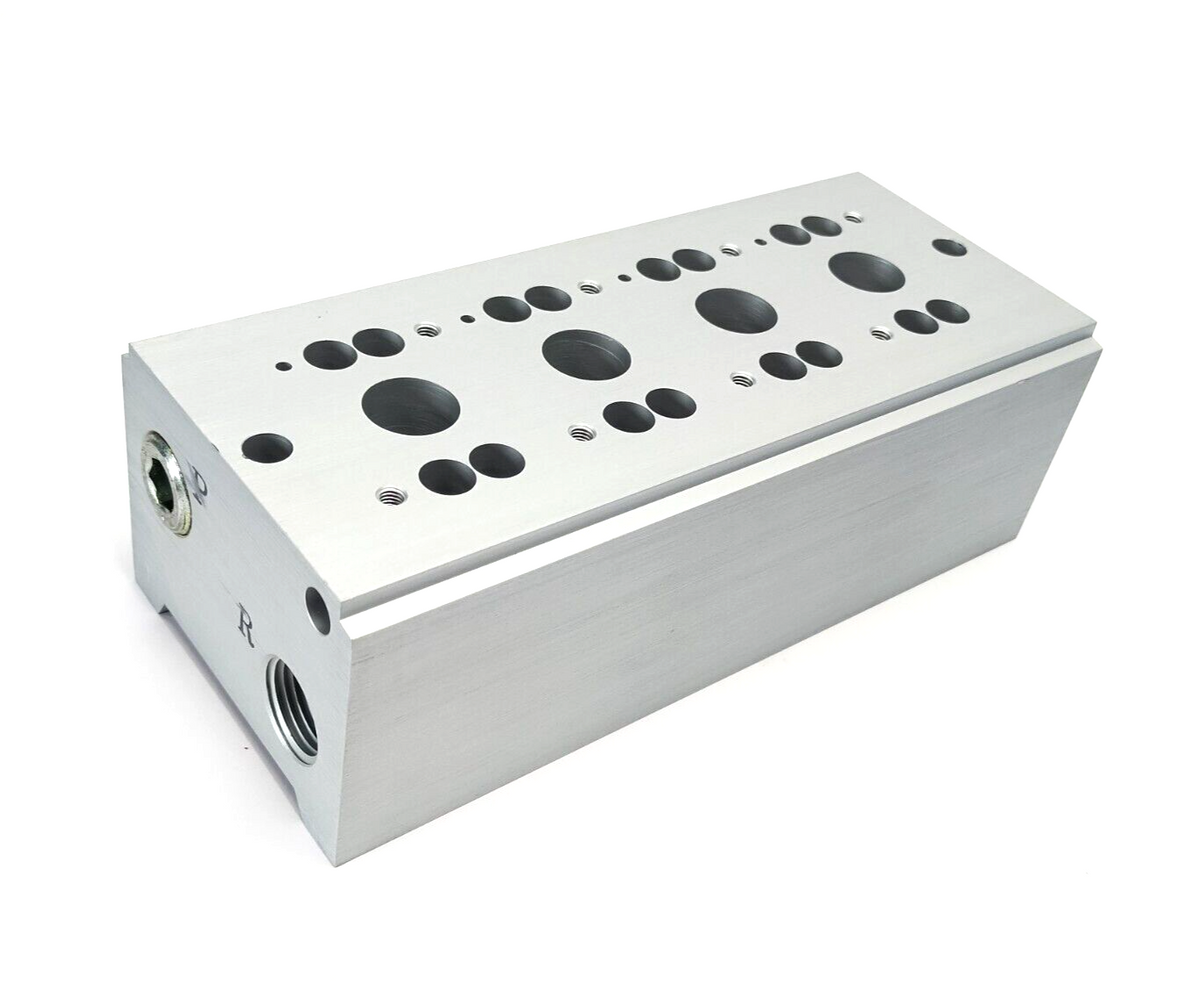 VV3PA7-41-041-04T | SMC 4-Station Pneumatic Manifold Base 1/2" NPT Ports - New Other - Maverick Industrial Sales