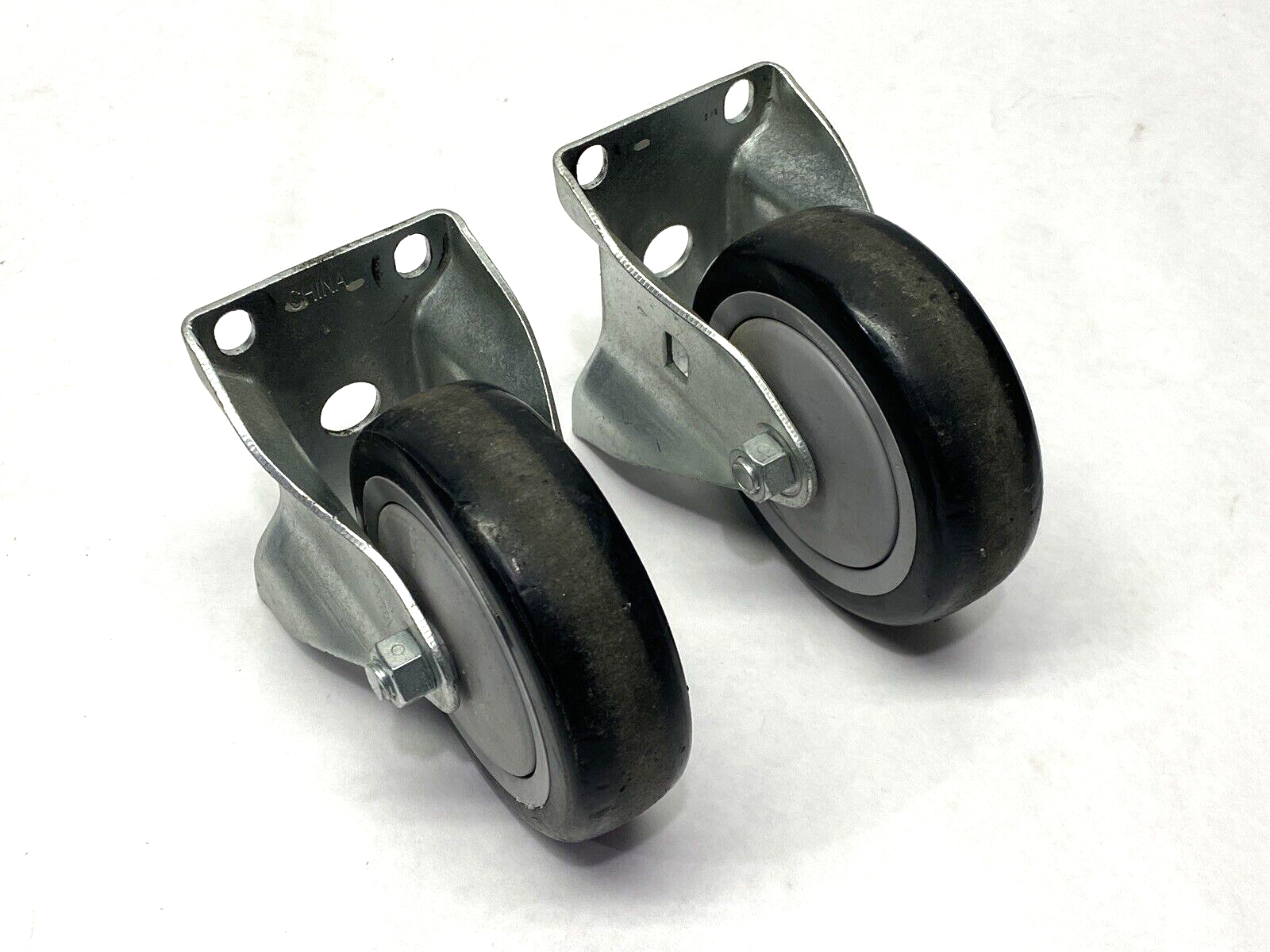 Casters 4" x 1-1/4" LOT OF 2 - Used - Maverick Industrial Sales