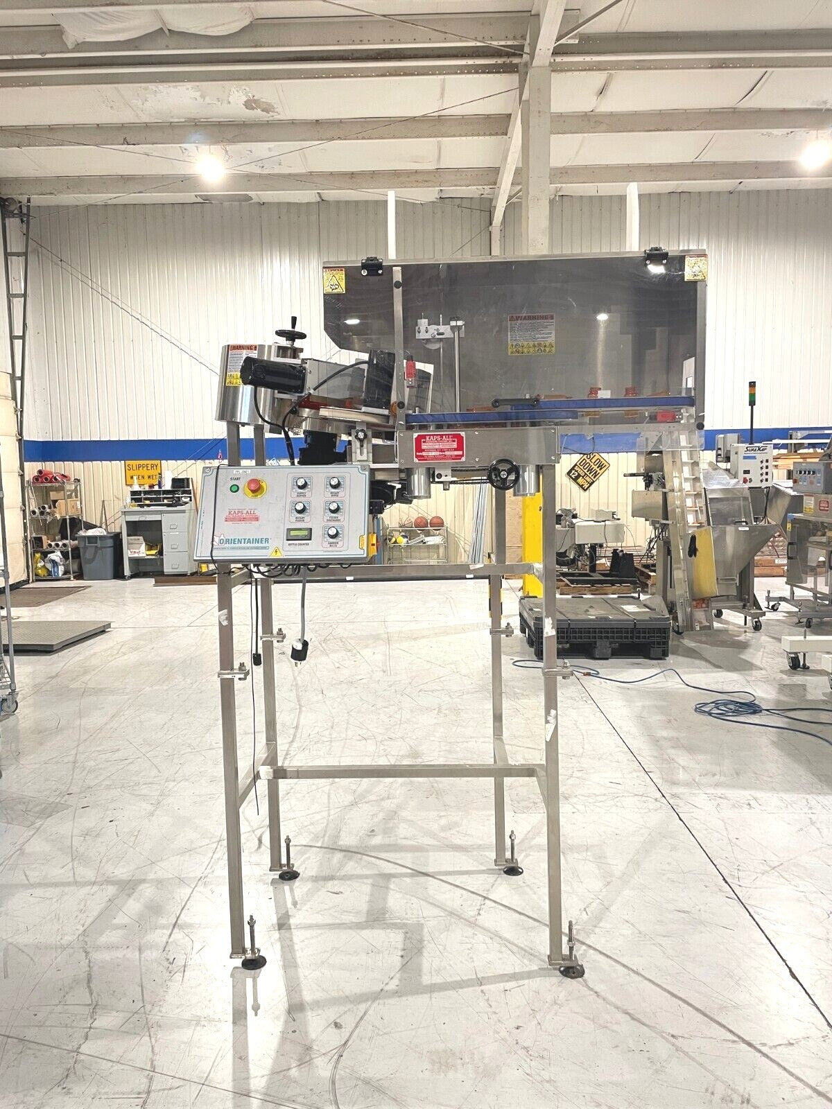 AU-3 | Kaps-All Orientainer, Automatic Bottle Unscrambler Feeder - Used - Maverick Industrial Sales