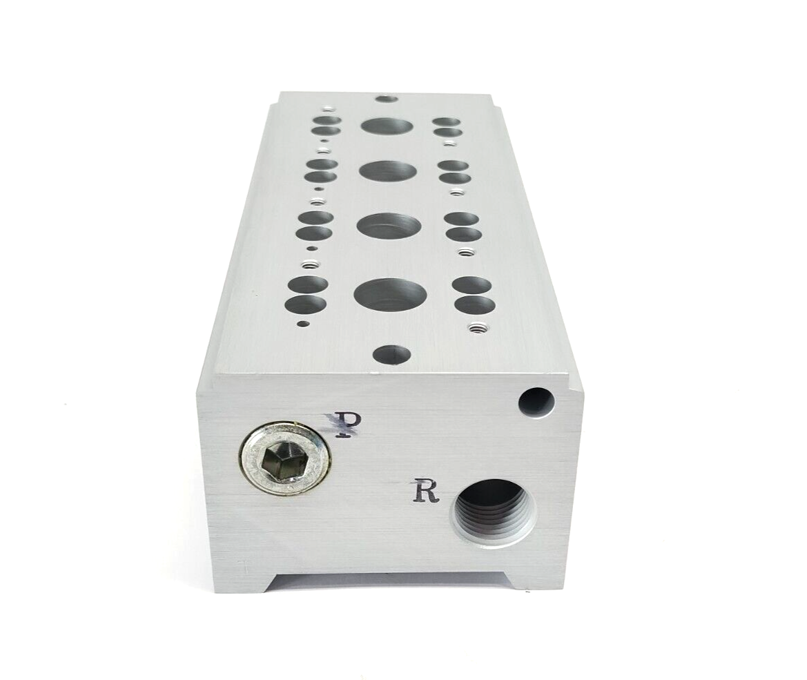 VV3PA7-41-041-04T | SMC 4-Station Pneumatic Manifold Base 1/2" NPT Ports - New Other - Maverick Industrial Sales