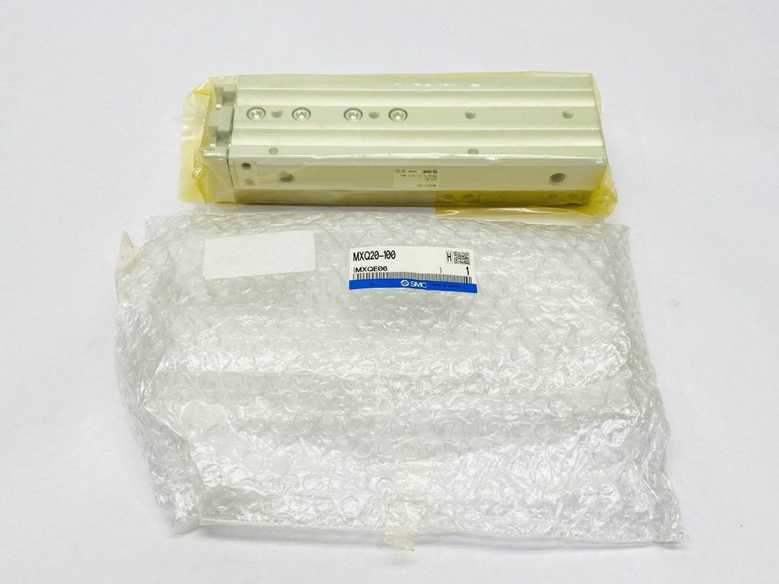 SMC MXQ20-100 Pneumatic Guided Slide Table 20mm Bore 100mm Stroke - Maverick Industrial Sales