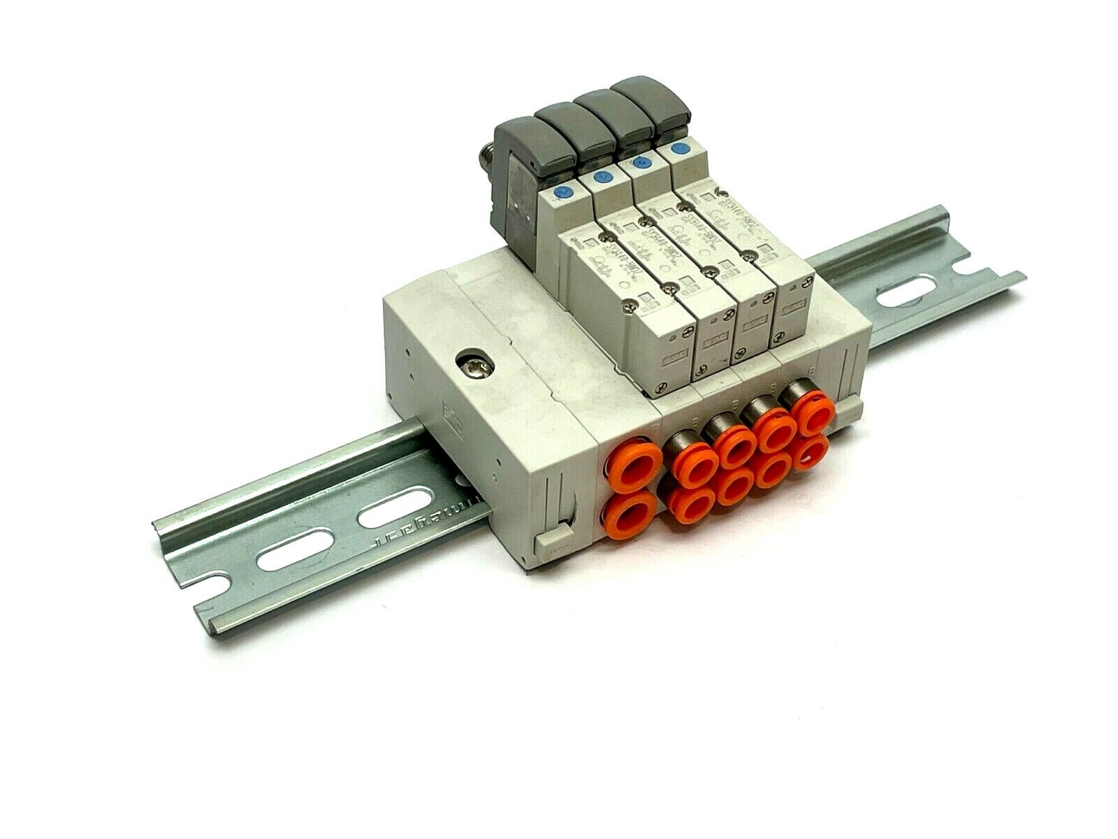 SS5Y3-45-04D-N7 | SMC Stacking Manifold w/ SY3140-5WOZ Solenoids - Used - Maverick Industrial Sales