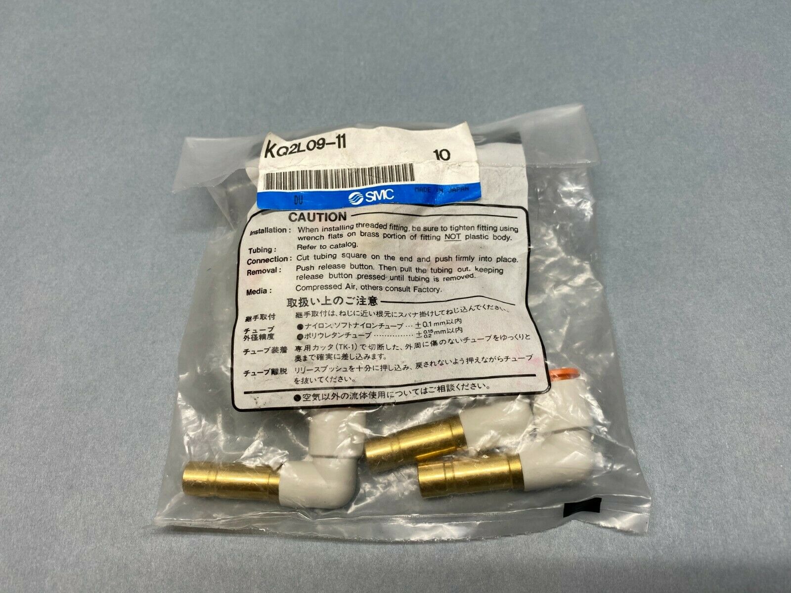 KQ2L09-11 | SMC Reducer Elbow 5/16" to 3/8" PKG OF 10 - New - Maverick Industrial Sales