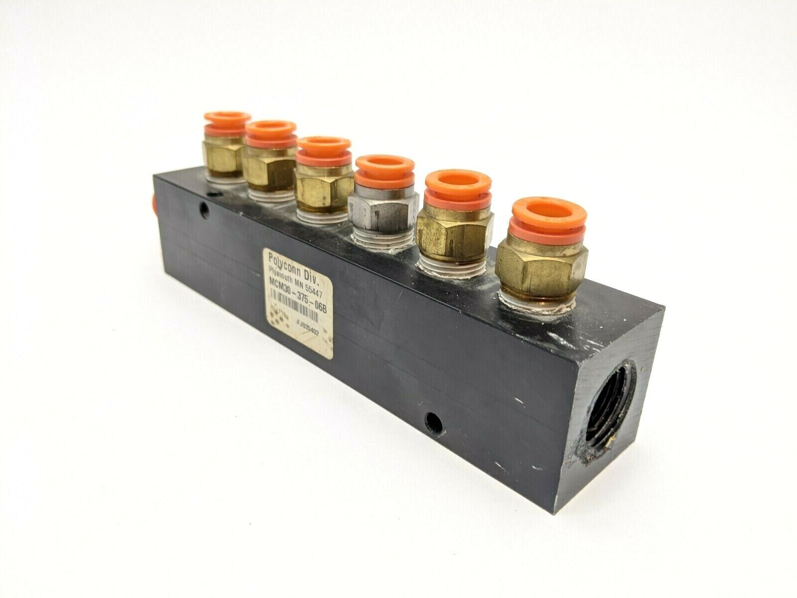 MCM30-375-06B | Polyconn Manifold 6 Port 3/8" NPT Outlets x 1/2" NPT Inlets - Used - Maverick Industrial Sales