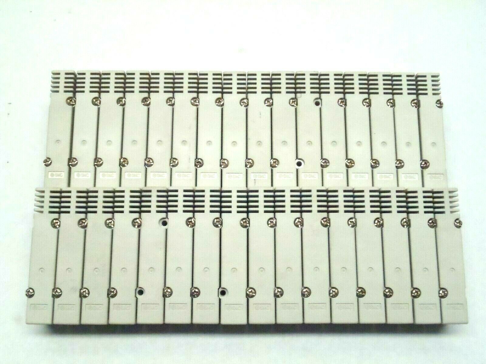 Lot of 32 SMC Manifold Valve Top End Rear Cap - Used - Maverick Industrial Sales