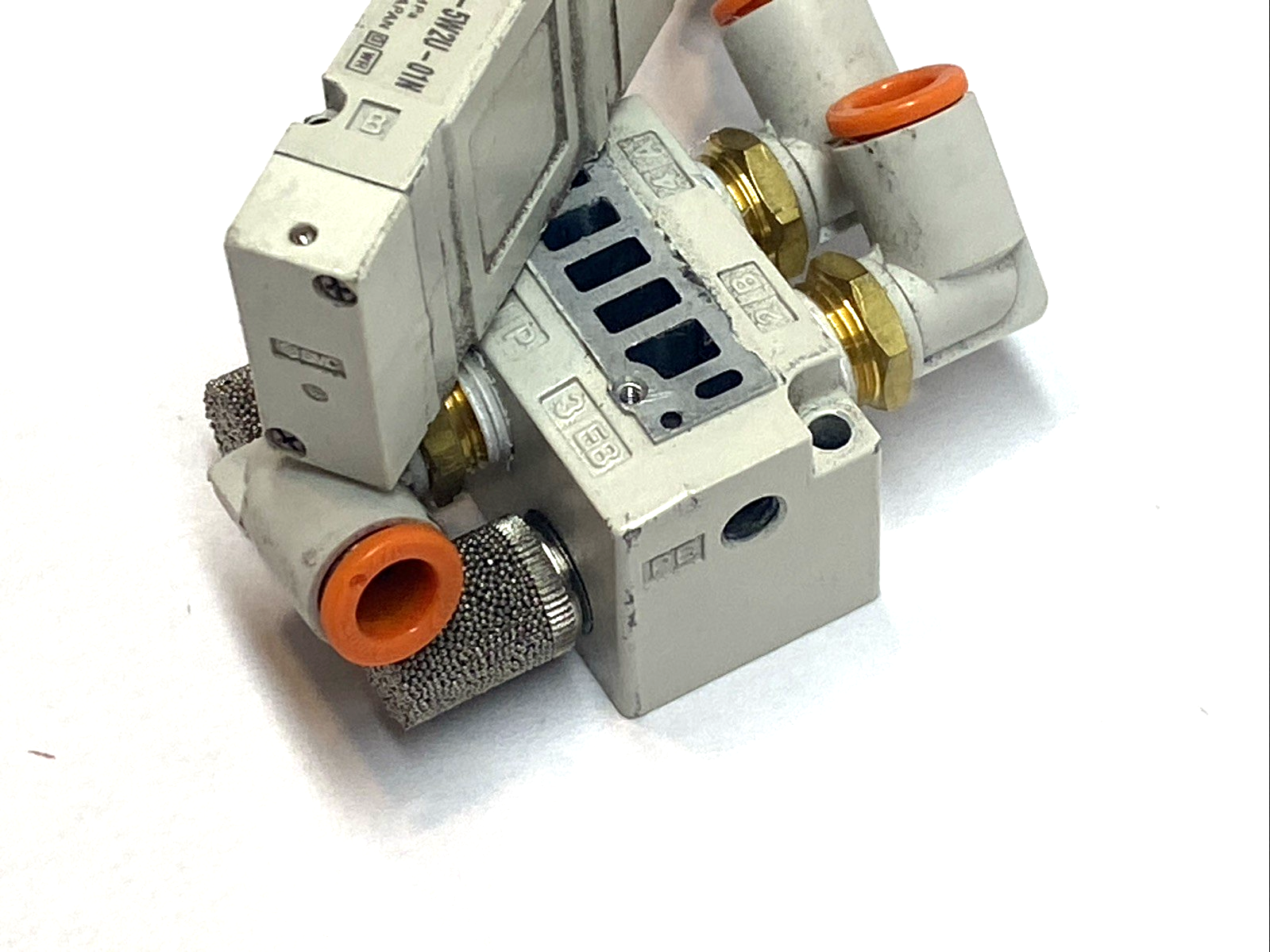 SV1100-5W2U-01N | SMC 5‑Port Solenoid Valve 2‑Position Single 24VDC MISSING SCREW - Used - Maverick Industrial Sales