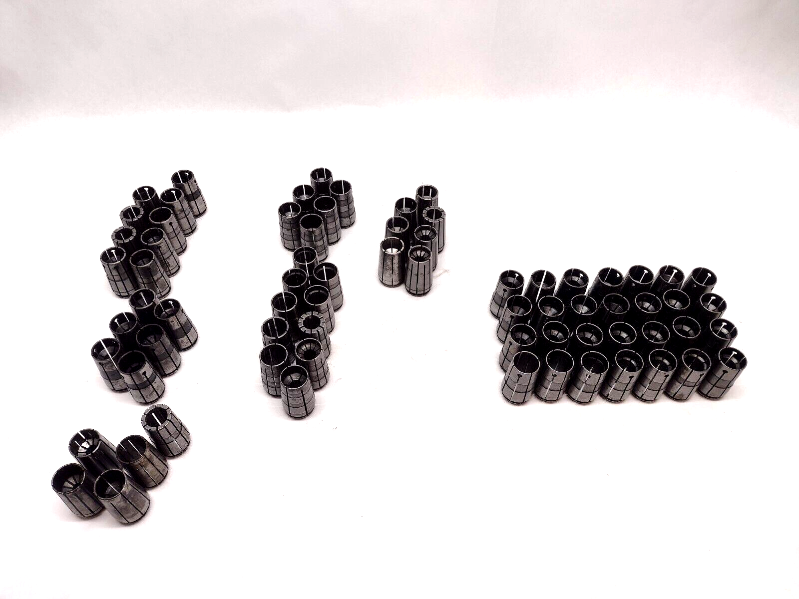 69 Pieces | Assorted CNC Spring Collets LOT OF 69 - Used - Maverick Industrial Sales