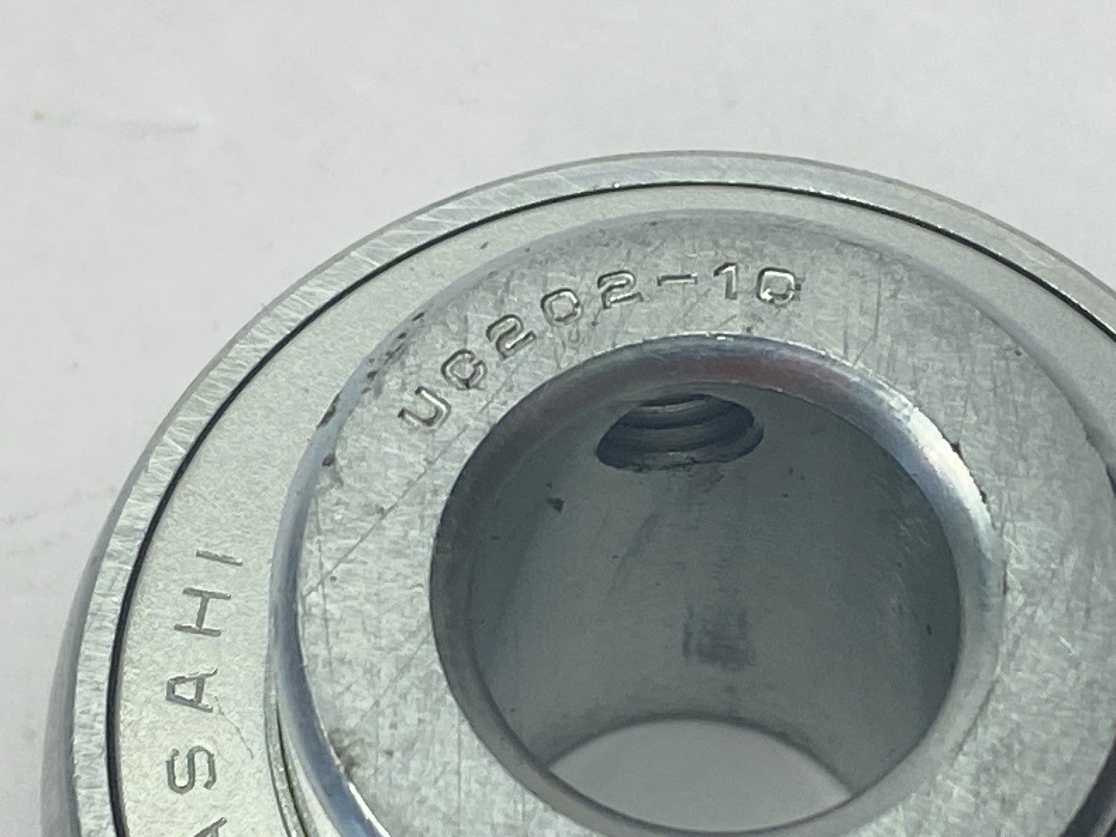Asahi UC202-10 Ball Bearing Insert - Maverick Industrial Sales