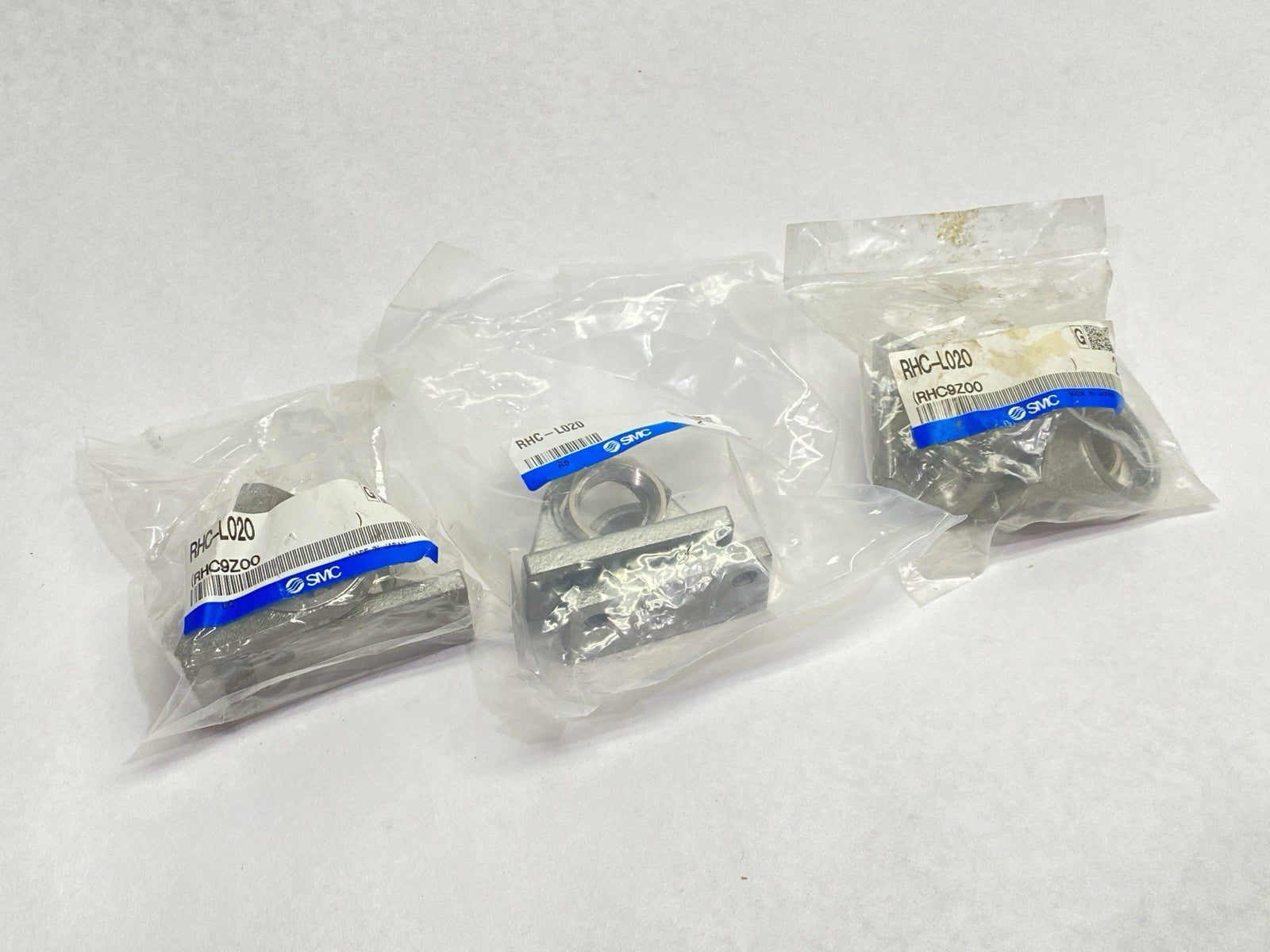 RHC-L020 | SMC Pneumatic Cylinder Foot Bracket LOT OF 3 - New - Maverick Industrial Sales