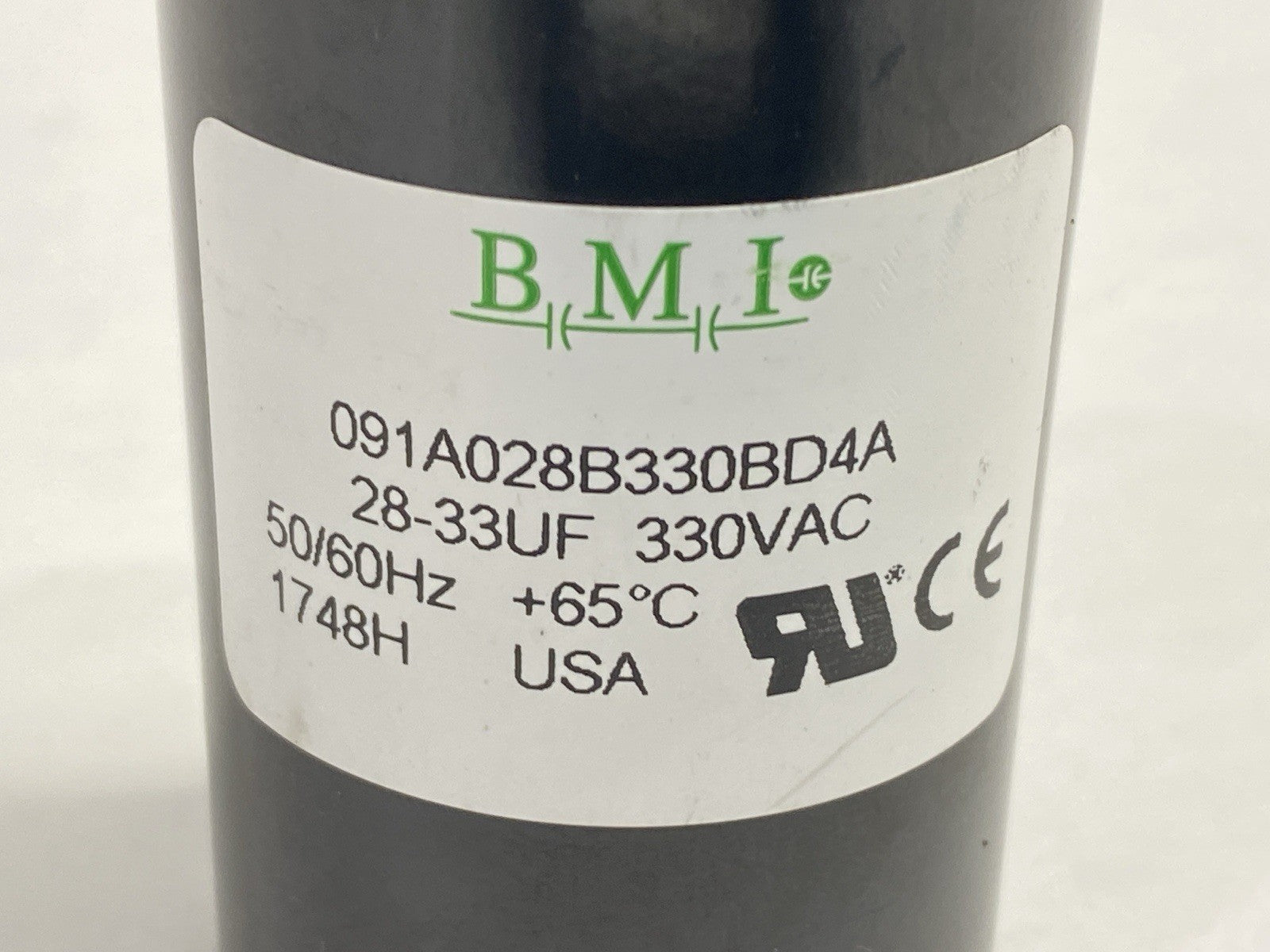 091A028B330BD4A | BMI Capacitor 28-34UF 330VAC - Used - Maverick Industrial Sales