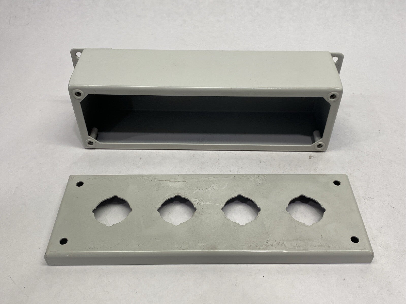 Saginaw Controls SCE-4PB Pushbutton Enclosure 4-Hole Gray - Maverick Industrial Sales