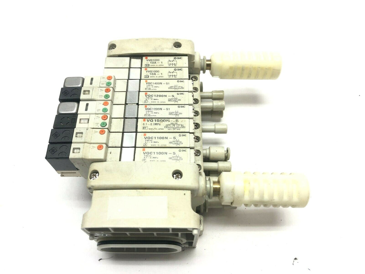VV5QC11-08C6FD0 | SMC Manifold Base w/ Solenoids - For parts or not working - Maverick Industrial Sales