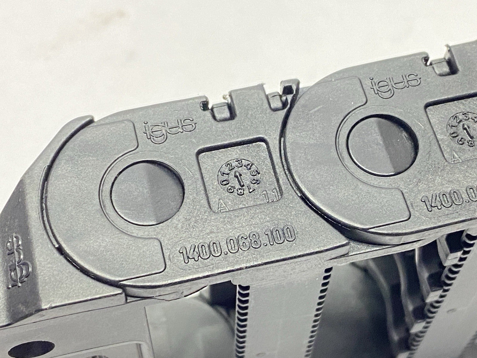 1400.068.100 | Igus E2 Energy Chain 16 Links w/ 14068.2PZ End Brackets - New Other - Maverick Industrial Sales
