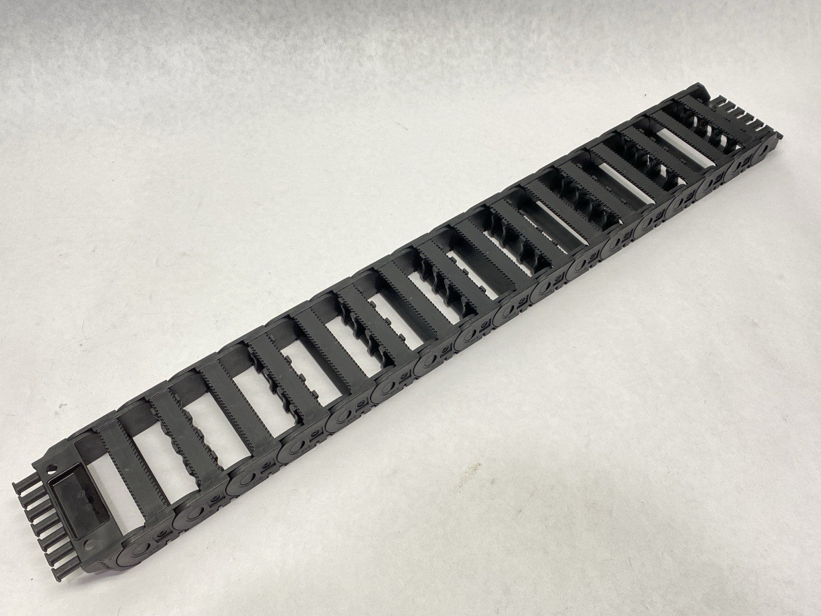 1400.068.100 | Igus E2 Energy Chain 16 Links w/ 14068.2PZ End Brackets - New Other - Maverick Industrial Sales