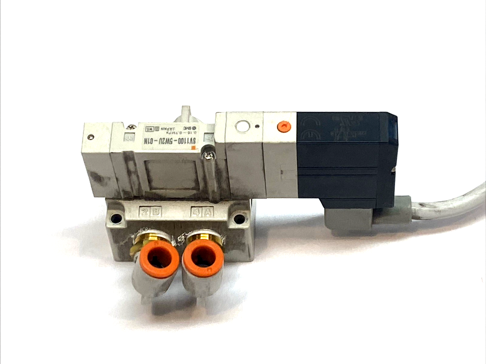 | SMC SV1100-5W2U-01N 5‑Port Solenoid Valve 2‑Position Single 24VDC M12 1/8 NPT - Used - Maverick Industrial Sales