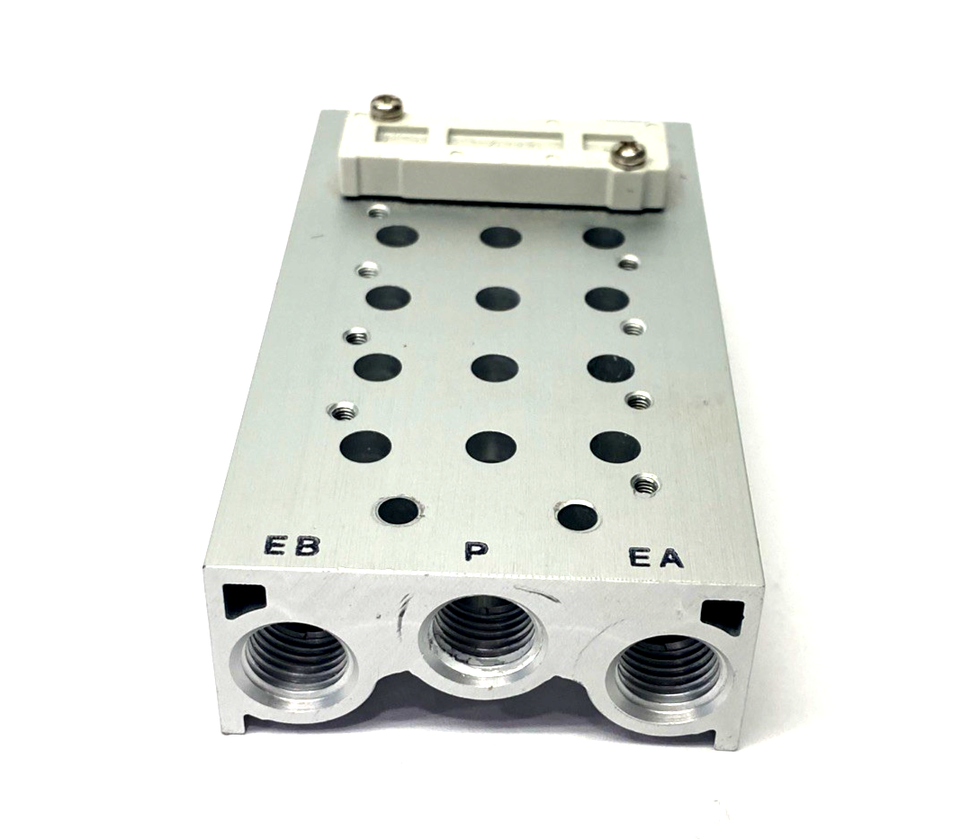 SS5Y5-20-05-00N | SMC Pneumatic Valve Manifold/Base, 5-Stations, 1/4" NPT - Used - Maverick Industrial Sales