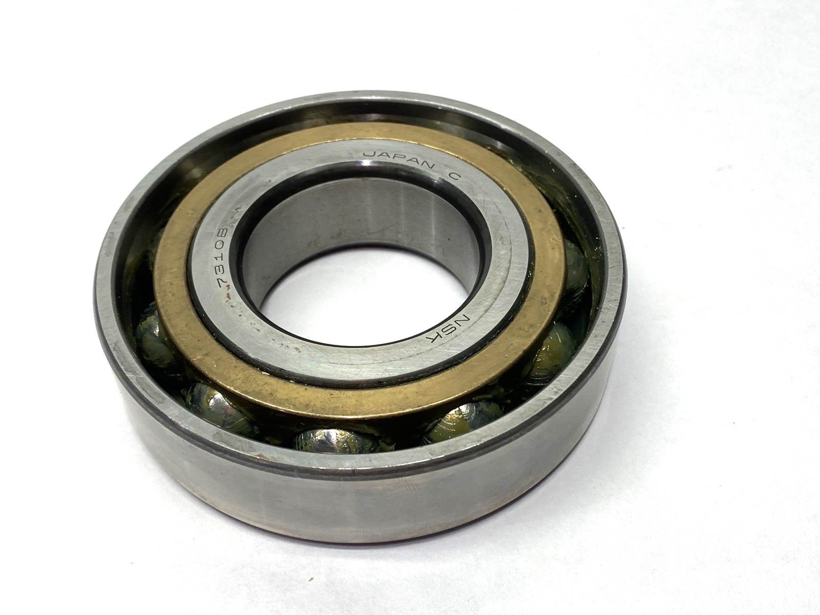 NSK 7310B Angular Contact Ball Bearing 50mm Bore 110mm O.D. 27mm Width - Maverick Industrial Sales