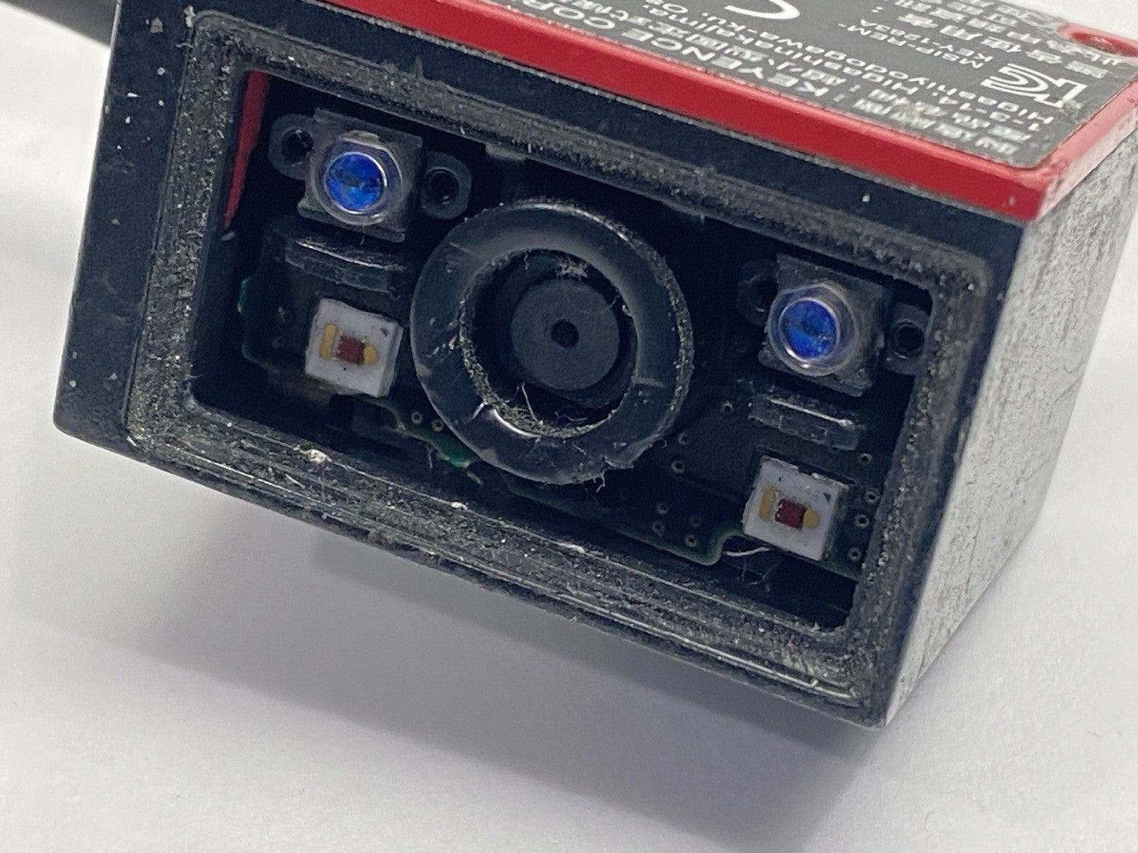SR-700 | Keyence Ultra-Compact 1D And 2D Code Reader Fixed Type MISSING COVER - For parts or not working - Maverick Industrial Sales