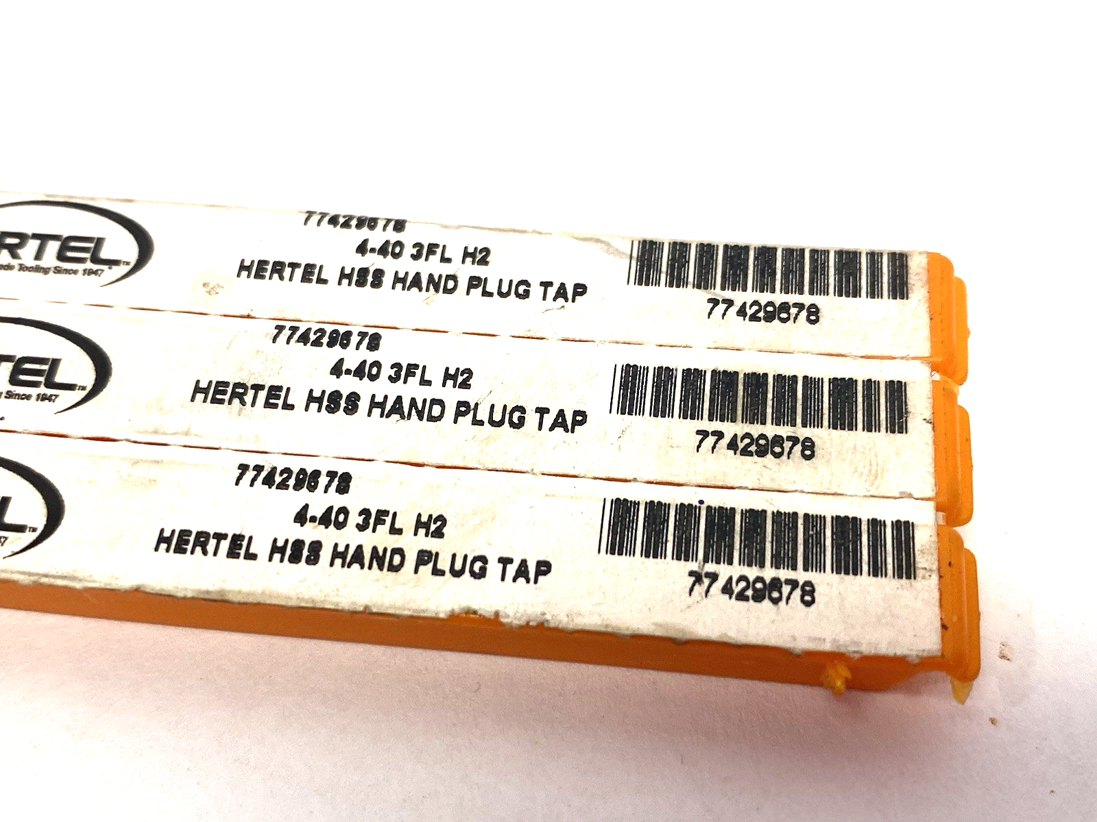 77429678 | Hertel Straight Flute Tap: #4-40 UNC, 3 Flute, Plug Chamfer, LOT OF 3 - New – Open box - Maverick Industrial Sales