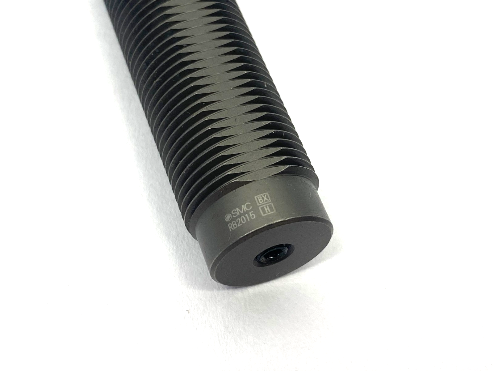 RB2015 | SMC Miniature Shock Absorber 15mm Stroke - Used - Maverick Industrial Sales