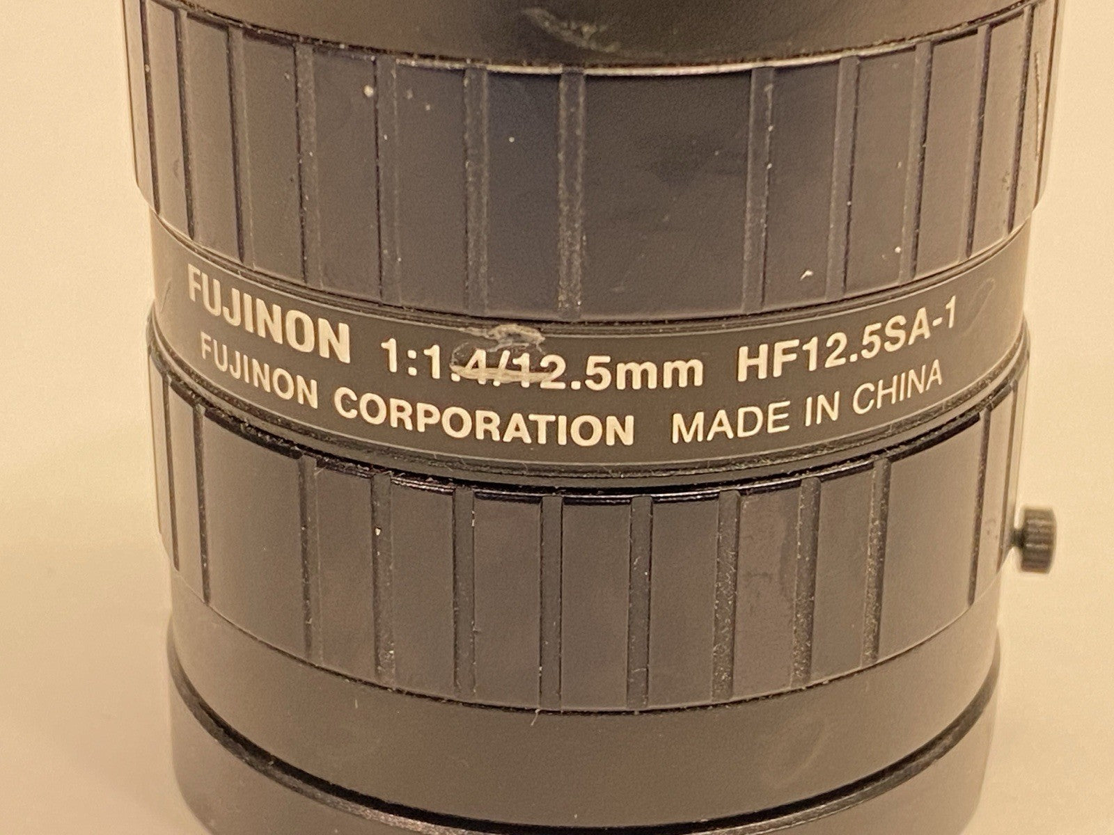 HF12.5SA-1 | Fujinon C-Mount Lens 1:1.4/12.5mm F1.4 - For parts or not working - Maverick Industrial Sales