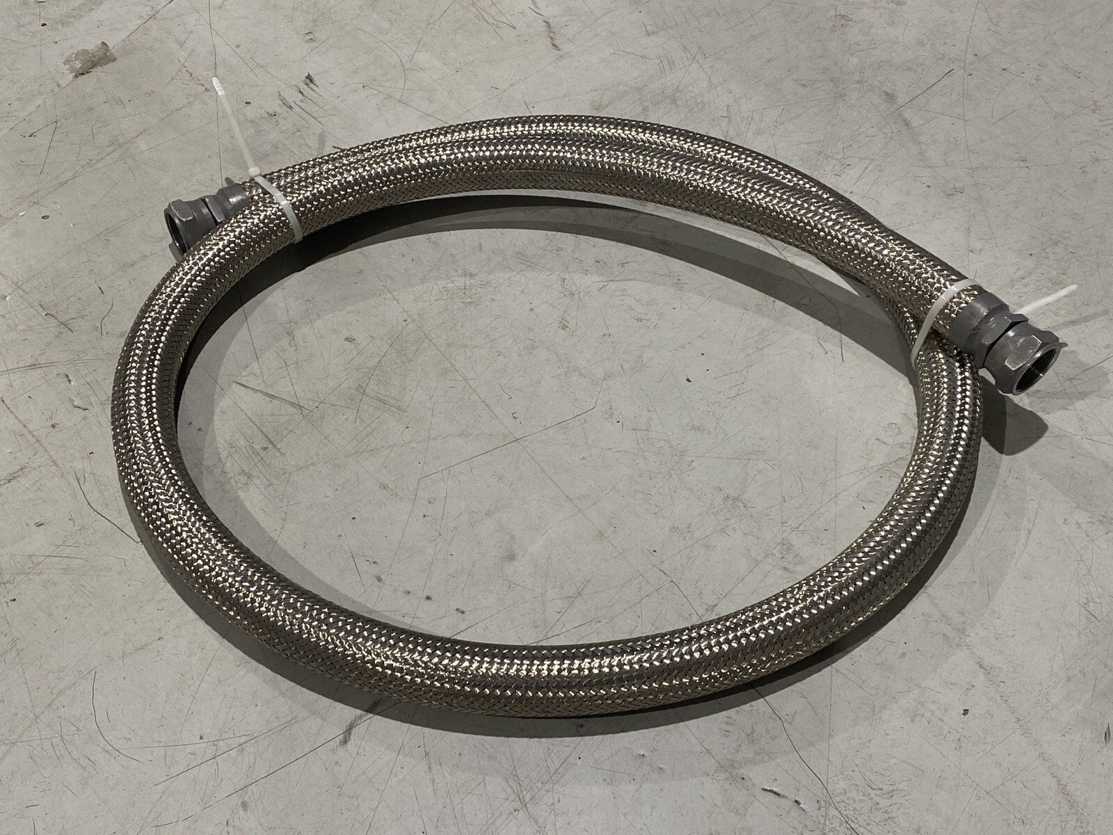 Braided Flexible Hose 2" Wide 10ft Length 1-3/4" NPT Female Connectors - Maverick Industrial Sales