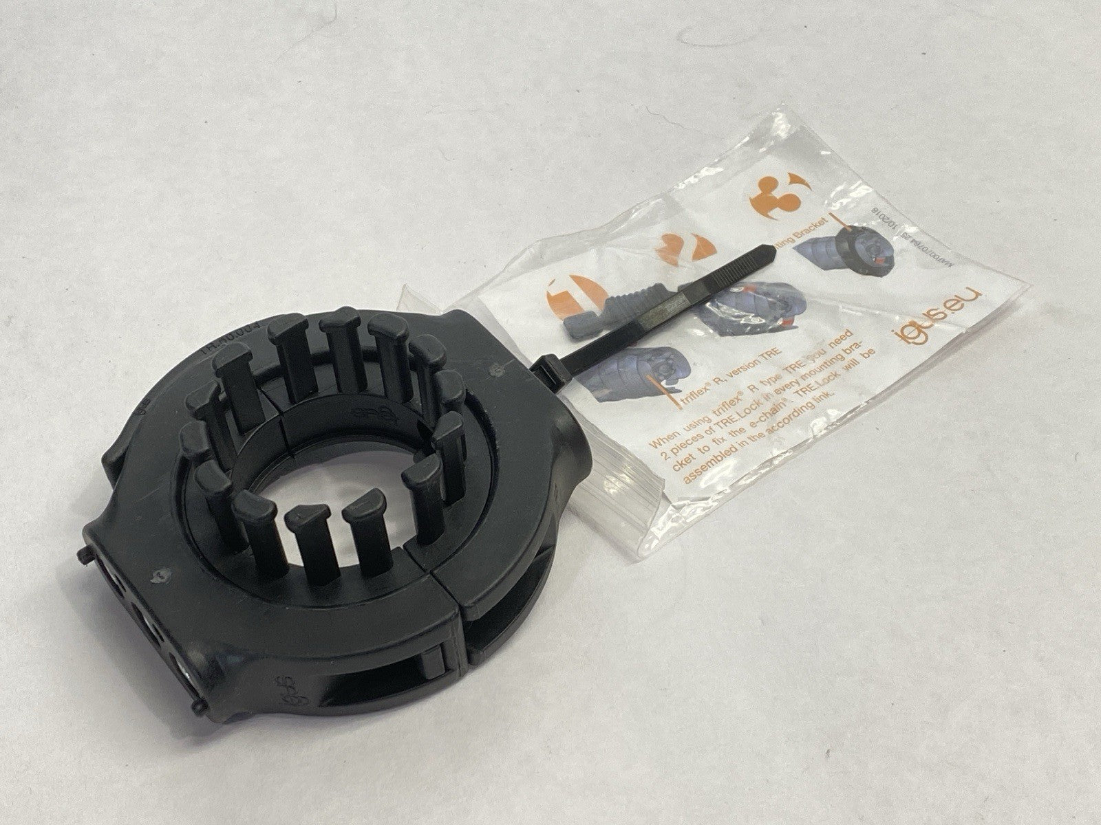 TR.40.01.M6 | Igus triflex R Standard Mounting Bracket w/ Strain Relief 70mm Dia. - New – Open box - Maverick Industrial Sales