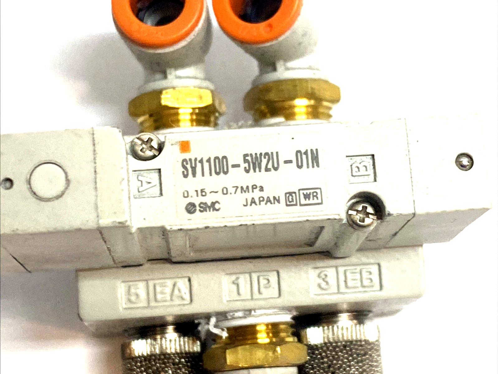| SMC SV1100-5W2U-01N 5‑Port Solenoid Valve 2‑Position Single 24VDC M12 1/8 NPT - Used - Maverick Industrial Sales