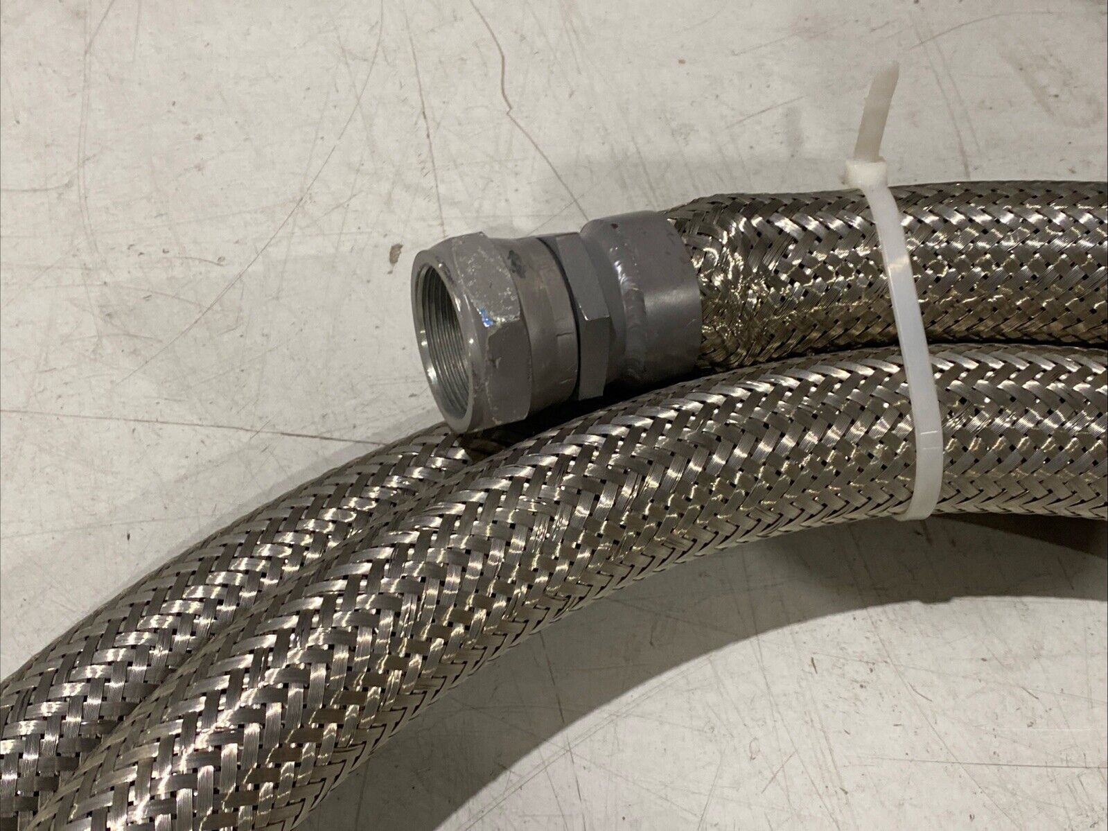Braided Flexible Hose 2" Wide 15ft Length 1-3/4" NPT Female Connectors - Maverick Industrial Sales
