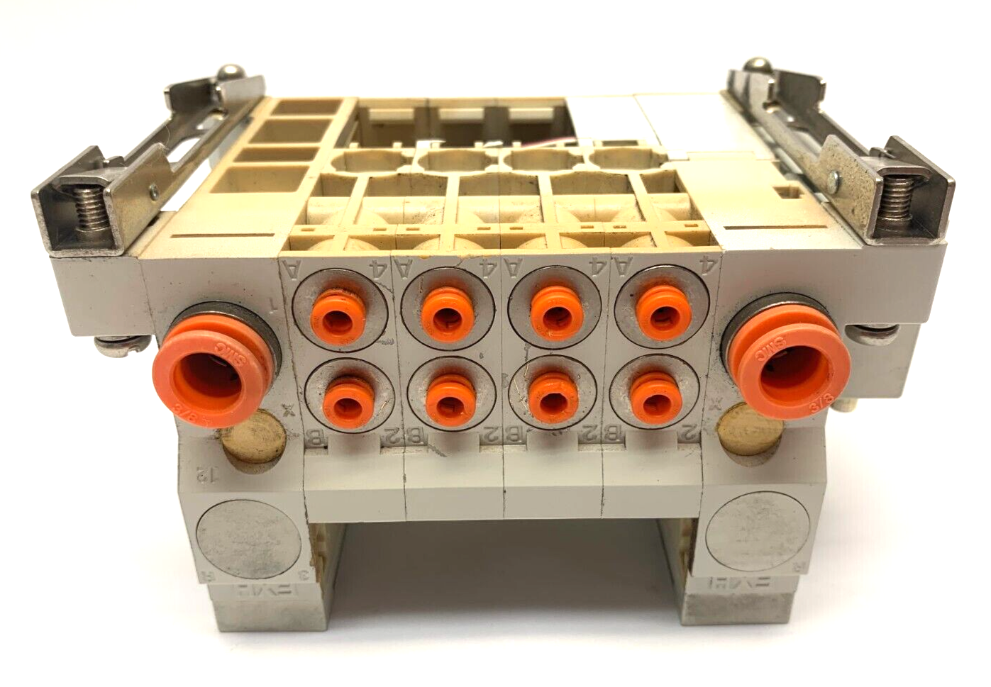 VV5Q11-04N3FS0-D0RS | SMC Plug In Manifold Assembly 4-Port - Used - Maverick Industrial Sales
