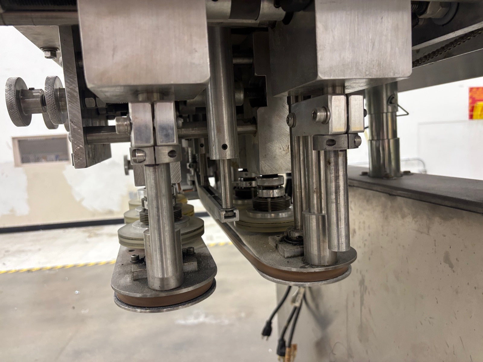 SK6000-BF6 | SureKap 6-Quill Capping Machine and Elevator, Capper - Used - Maverick Industrial Sales