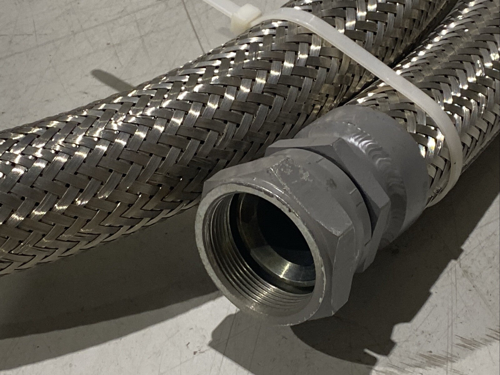 Braided Flexible Hose 2" Wide 12ft Length 1-3/4" NPT Female Connectors - Maverick Industrial Sales