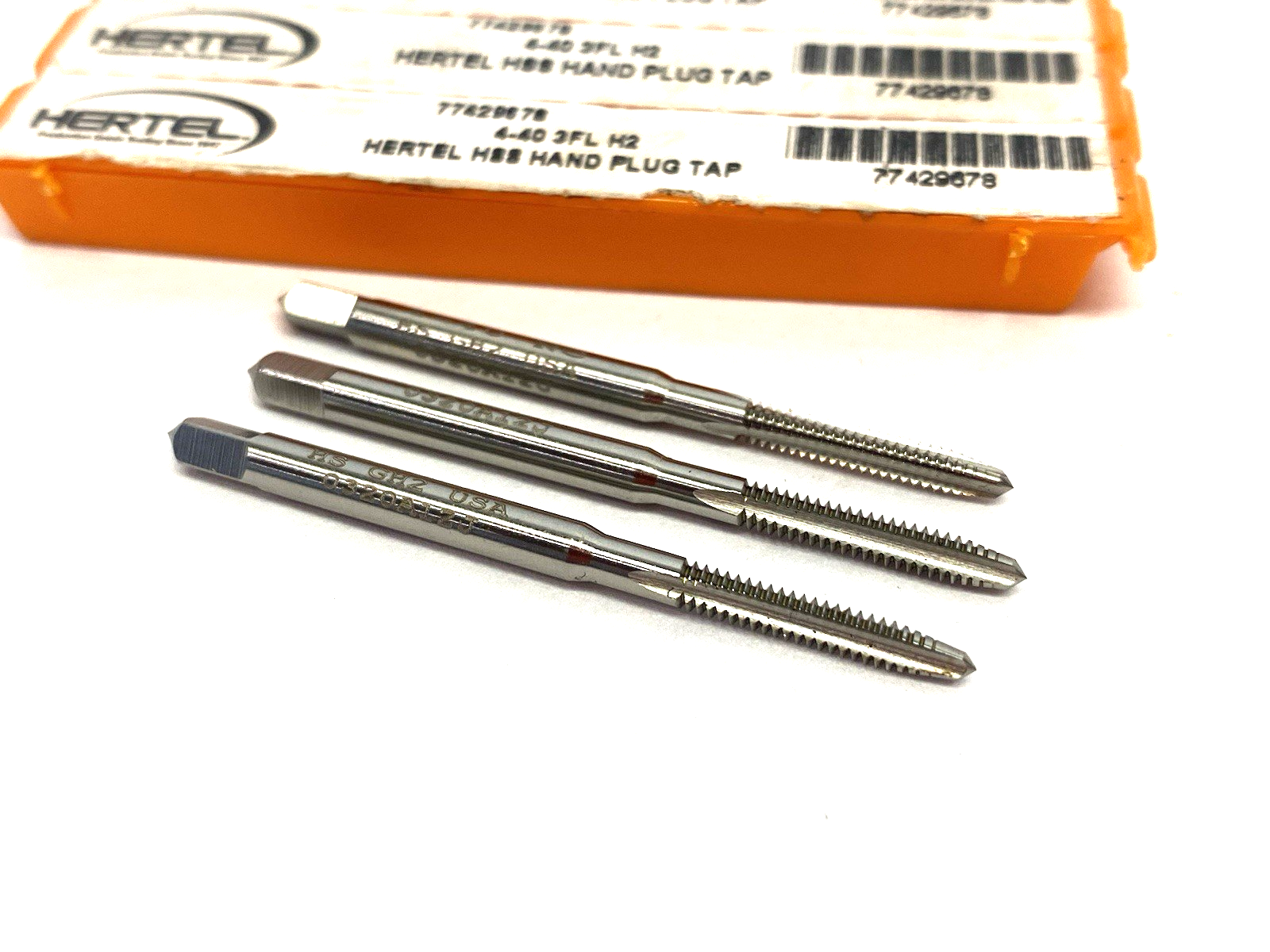 77429678 | Hertel Straight Flute Tap: #4-40 UNC, 3 Flute, Plug Chamfer, LOT OF 3 - New – Open box - Maverick Industrial Sales
