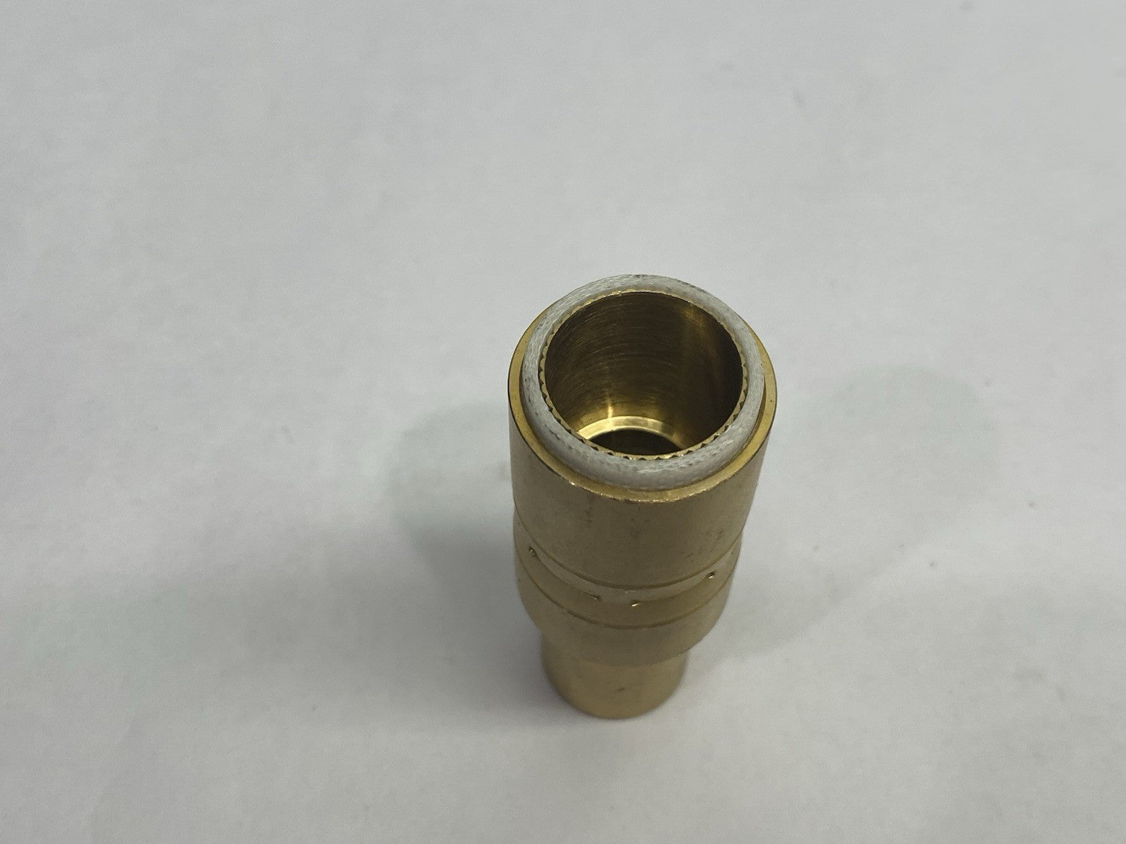 401-51-62 | Tregaskiss Slip-On Air Cooled Nozzle 5/8″ bore, flush tip, brass - New – Open box - Maverick Industrial Sales