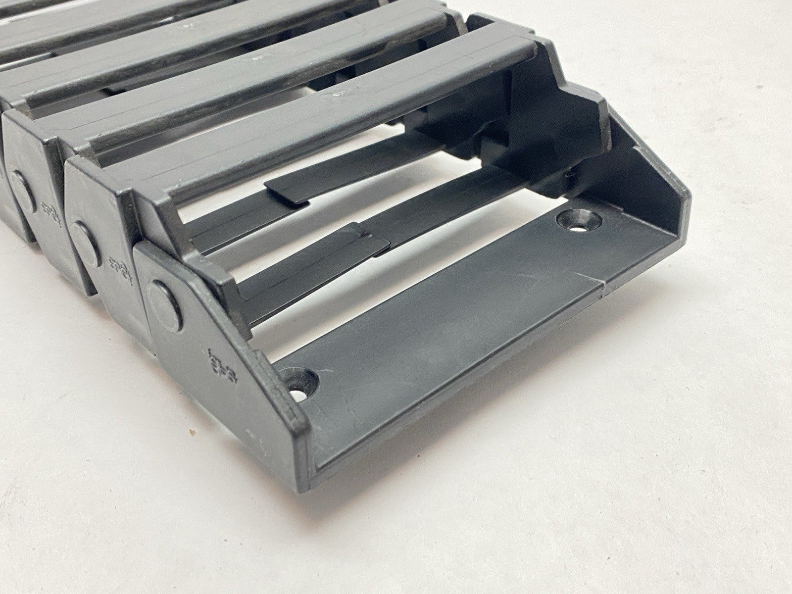 E16.7.060 | Igus E-Chain Assembly 17-Links 1.7ft Length w/ 117.7.P End Bracket - Used - Maverick Industrial Sales