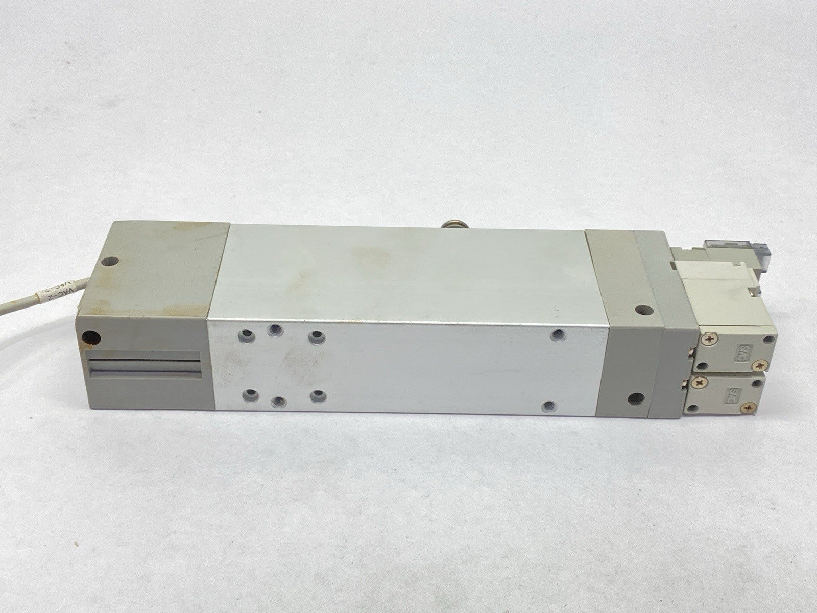 NZL112-K15MZ-E65L | SMC Multi-Stage Vacuum Ejector - Used - Maverick Industrial Sales