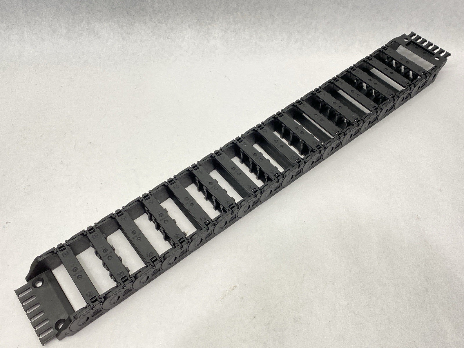 1400.068.100 | Igus E2 Energy Chain 16 Links w/ 14068.2PZ End Brackets - New Other - Maverick Industrial Sales