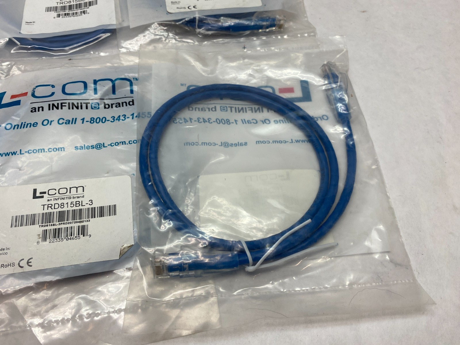 TRD815BL-3 | L-Com Ethernet Patch Cable Cat5e Blue LOT OF 9 - New - Maverick Industrial Sales