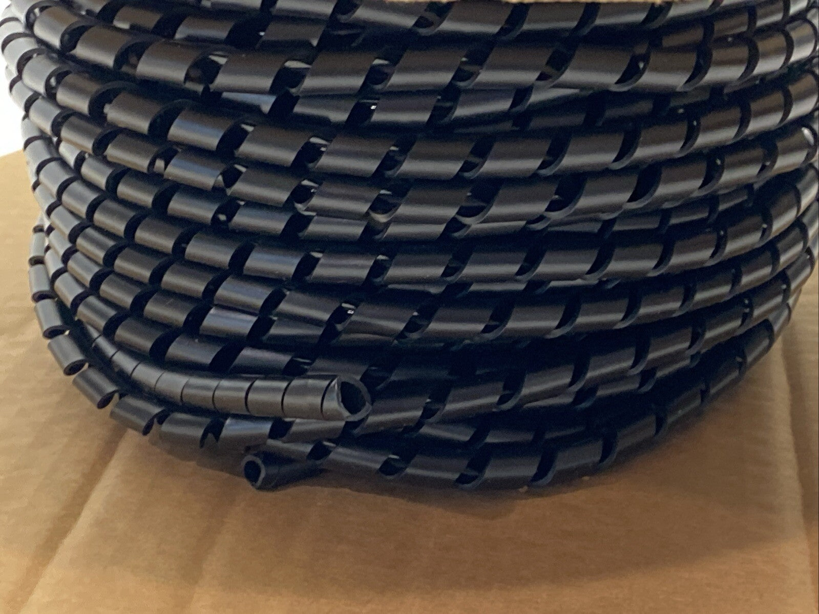 Panduit T38F-C0 Polyethylene Spiral Wrap Black .38" x 100ft Weather Resistant - Maverick Industrial Sales