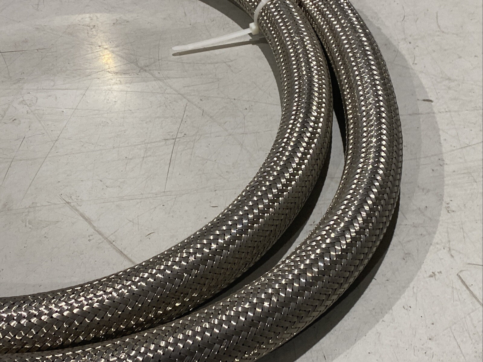 Braided Flexible Hose 2" Wide 12ft Length 1-3/4" NPT Female Connectors - Maverick Industrial Sales