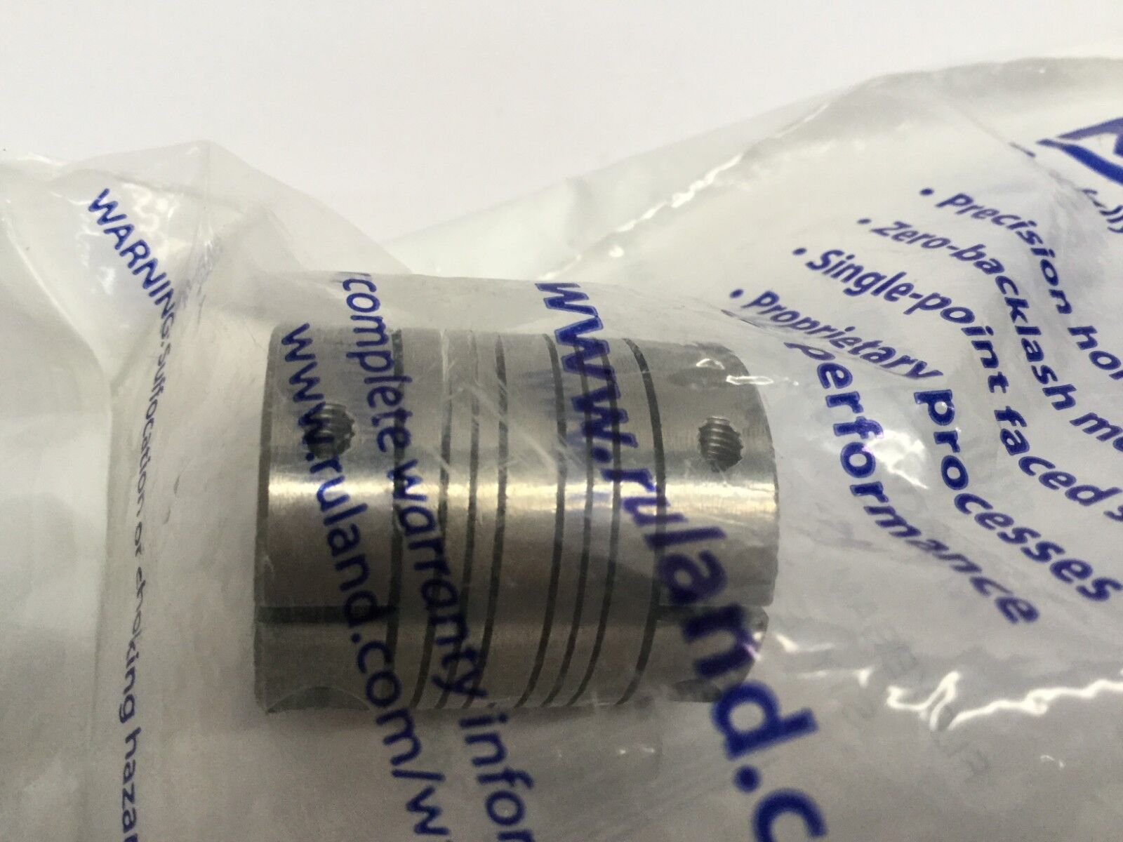 Ruland MWC25-9-8-SS Flexbeam-2 Coupling, Clamp Style, Stainless Steel - Maverick Industrial Sales